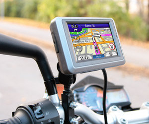 This affordable, compact motorcycle navigator mounts neatly on your bars, ready to guide your ride with spoken street names sent wirelessly to your Bluetooth-enabled helmet or headset.
