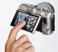 Tilting, touch sensitive LCD