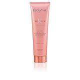 Una crema de pre-estilo de tratamiento para el pelo rizado indisciplinado en necesidad de definición y rizos relajados