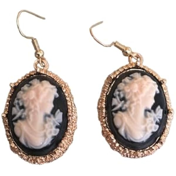 Boucles d'oreilles Dormeuses en or jaune 18K (750/oo), sertie chacune
