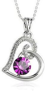 Swarovski Elements Crystal Heart shaped Pendant Necklace set with 28 small clear CZ stones and 1 large Amethyst Crystal on a 16 inch Chain. We have other colours &amp; styles Available. Only at Nambeads..