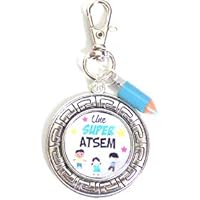un porte clé, bijou de sac argenté "atsem ?"