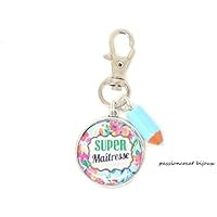 bijoux de sac, un porte-clé argenté cabochon "super maîtresse"