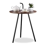 Hingucker: Dekorativer Rundtisch versprüht Retro-Charme und setzt stilvolle Akzente im Wohnbereich