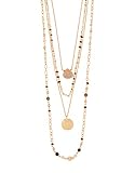 Diese mehrlagige Halskette besteht aus vier langen Ketten für einen eleganten Look. Das Accessoire umfasst einen Münzanhänger mit Hammerschlageffekt, steinähnliche Perlen und ein Gliedermix für einen interessanten Effekt. Mit Verlängerungskette und Karabinerverschluss.