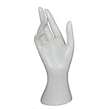 Die Hand kann wie gezeigt aufgerichtet werden, damit der Schmuck einen dreidimensionalen Effekt hat