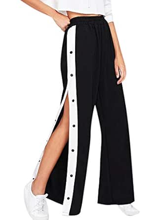 pantaloni adidas aperti ai lati