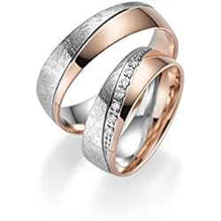 Par de alianzas de oro 333 en oro rojo y blanco con piedra