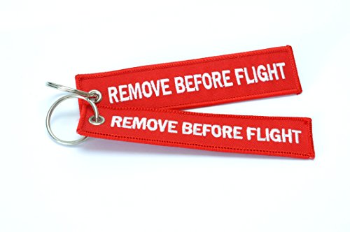 Etiqueta para equipaje con llavero. Con leyenda en inglés 