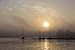 Produktbild Artland Poster Kunstdruck oder Leinwand-Bild Wandbild fertig aufgespannt auf Keilrahmen Rico Ködder Sonnenaufgang im Stadthafen Rostock Fahrzeuge Boote Schiffe Fotografie Orange