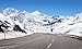 Produktbild Alu-Dibond-Bild 150 x 90 cm: "Mountain road in a sunny day. Simplon Pass, Valais, Switzerland", Bild auf Alu-Dibond