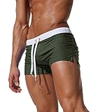 [Trajes de baño clásicos]------Los hombres y los muchachos adolescentes rápidamente secan el traje de baño del resbalón con los bolsillos y la cremallera, cortocircuitos activos de los hombres de la pierna cuadrada
