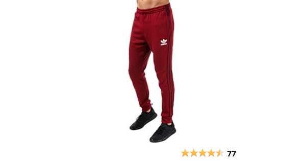 adidas sst track pants burgundy