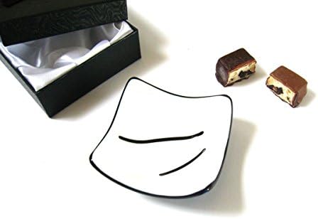 Tiny black and white fused glass candle holder dish with a metallic glass base