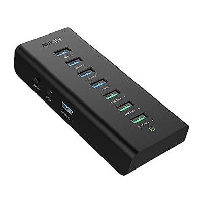 AUKEY HUB USB Alimenté 7 Ports ( 4 * USB 3.0 + 3 * Charge 2,4A ) Hub USB 3.0 SuperSpeed avec Adaptateur d'Alimentation 36W compatible avec Windows XP / Vista / 7 / 8 / 10 , Mac OS , Linux etc ( Noir )