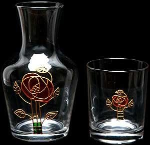 Water Set comprising carafe and glass in a Mackintosh Pink Rose Design. Handpainted and designed in the UK by Beverley Gallagher, these significant and expressive gifts are ideal for birthdays, anniversaries, weddings, engagements, Christmas, Valentine’s Day, Mother’s Day, Easter and special celebrations.