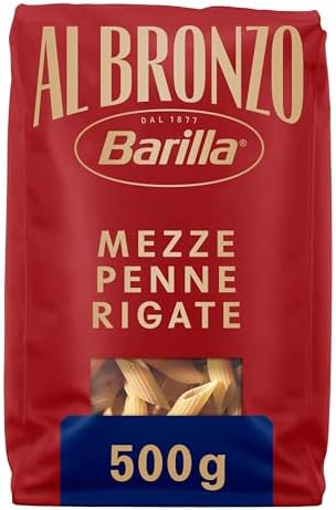 Barilla Pasta Al Bronzo Mezze Penne Rigate 100% Grano Italiano, Pasta Trafilata Al Bronzo con Lavorazione al Bronzo Grezzo, Formato Spesso e Corposo, Alta Tenuta di Sugo e Cottura, 500 g