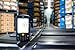 Produktbild Alu-Dibond-Bild 140 x 90 cm: "Bluetooth barcode scanner in front of modern warehouse", Bild auf Alu-Dibond