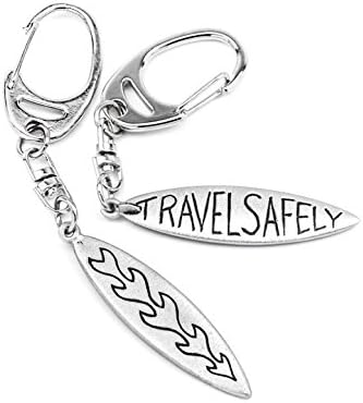 Metal Planet Ltd Surfboard keyring with 'Travel Safely' message