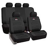 Kopfstützenöffnungen mit Klettverschluss; Die Rückseite der Vordersitze werden vollständig verdeckt; Mit dreifach teilbarer Rücksitzlehne