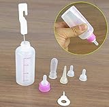 Mit einer speziellen Bürste, um das Innere der Flasche leicht zu reinigen.