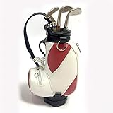 BEWEGLICHER GOLFWAGENGRIFF: Durch den simulierten Golfwagengriff und die funktionierenden Gummiräder an jede Schreibtischebene anpassbar.