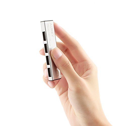 Aukey Hub USB 4 Ports Steckdosenleiste USB Hub Ultra Mini Kompatibel mit Windows XP/Vista/7/8/10, Mac OS, Linux, silber (4 Ports)