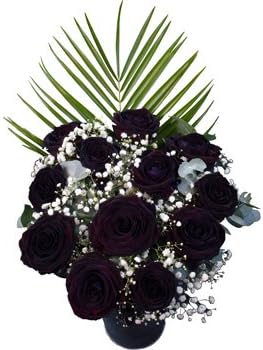 12 Premium Black Roses presented in a luxurious hand tied bouquet with exotic and lush foliage delivered for FREE by interRose, the UK's Rose Delivery Specialist