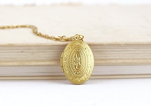 Small, delicate oval gold brass locket pendant necklace
