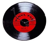 schallplattenuhr schweiz Der weiße Minutenzeiger der schwarzen Schallplatten-Wanduhr aus Glas wurde einem Tonarm nachempfunden.