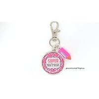 bijoux de sac, un porte-clé argenté cabochon "super maîtresse"