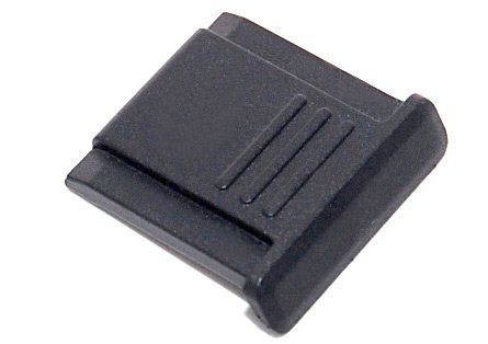 Cache griffe flash  cache sabot flash universel pour reflex CANON NIKON PENTAX OLYMPUS   All In Magic  nettoyage optique 