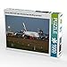 Produktbild CALVENDO Puzzle Emirates A380 A6-EOP rollt in Düsseldorf zum Abendflug nach Dubai. 1000 Teile Lege-Größe 64 x 48 cm Foto-Puzzle Bild von Spoddig Rainer