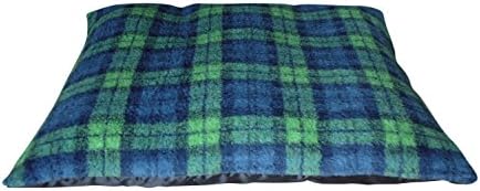 Small-sized luxury pillow shaped dog bed in green and blue tartan fleece. Super soft fleece top. Unique luxury deep fill channelled fibre filling to prevent shape loss. Size 26.5" x 22" x 5" thick. Size suitable for cocker spaniel, cockapoo etc. Made in Britain.