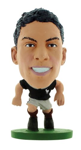 SoccerStarzInternational Figurine Blister Pack Featuring Raphael Varane in France's Home Kit