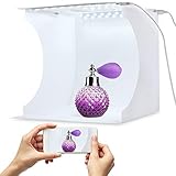 Delicadamente diseñado con material de primera calidad, el mini estudio fotográfico LED puede reflejar la luz de manera uniforme y presenta una calidad impermeable, a prueba de humedad y arrugas. brillo del producto, más perfecto de repente características del producto y belleza.