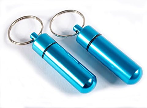 Mini pillbox made of aluminium with keyring / waterproof, for storing small items such as tablets or pills / also makes a lovely gift tat. Size 5.2 cm * 1.4 cm. Colour: turquoise
