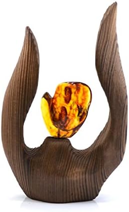 BIG PIECE OF GENUINE AMBER IN HAND MADE WOODEN FLAME