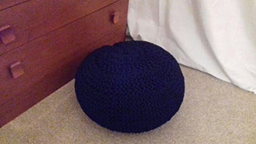 Black garter stitch pouf in chunky recycled cotton with double moss stitch matching cushion