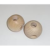 2 Holzkugel über Kreuz durchgehend gebohrt. D 40mm, verschiedene Durchmesser der Bohrungen wählbar.