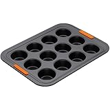 Le Creuset - Molde para 12 cupcakes de acero al carbono, 34 x 26 cm, color negro