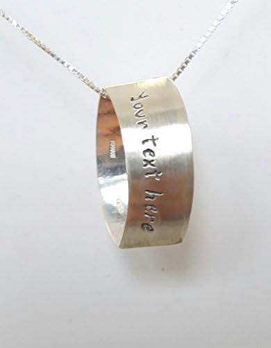 Silver pendant flat ring, used as pendant or necklace, apparently round with custom text.