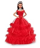 Anlässlich ihres 30-jährigen Jubiläums trägt sie ein wunderschönes rotes Abendkleid, das dem Kleid der allerersten Holiday Barbie nachempfunden ist
