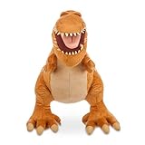 Butch, el tiranosaurio, exhibe su dentadura de fieltro e intimida por su estatura, igual que cuando vaga por las praderas. Este peluche de El viaje de Arlo tiene un acabado con textura y marcas estampadas.