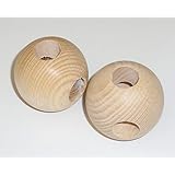 2 Holzkugel über Kreuz durchgehend gebohrt. D 45mm, verschiedene Durchmesser der Bohrungen wählbar.