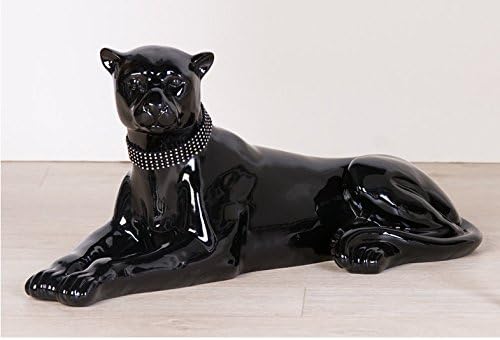 Big statue of panther black, resin, lying position, length 59 centimeters