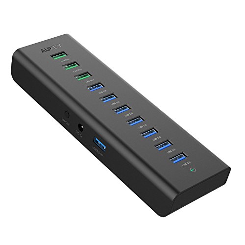 AUKEY USB 3.0 Hub 7 Datenports mit 3 Ladeports mit 48W Netzteiladapter Schwarz für USB kompatiblen Geräten