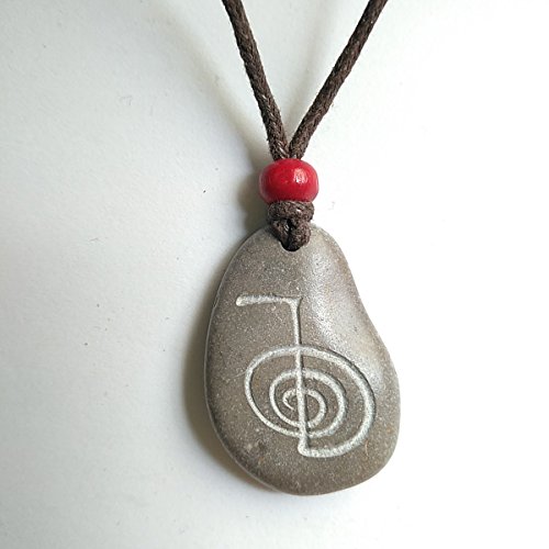 Buy CARVED STONE PENDANT WITH A REIKI 