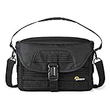 Die Schultertasche wird mit Zubehörmodulen geliefert, um das Fassungsvermögen über SlipLock an der Außenseite zu erweitern; befestigen Sie mit den Tragegurten ein kompaktes Stativ oder Wanderstöcke oder nutzen Sie sie Gurte zur Befestigung am Trolley