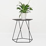Esta mesa tiene un diseño simple y una apariencia hermosa que se puede usar en su estudio, dormitorio o sala de estar.